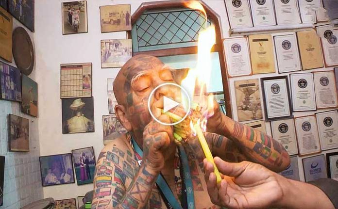 agzinda-65-tane-mum-yakarak-dunya-rekoru-kirdi