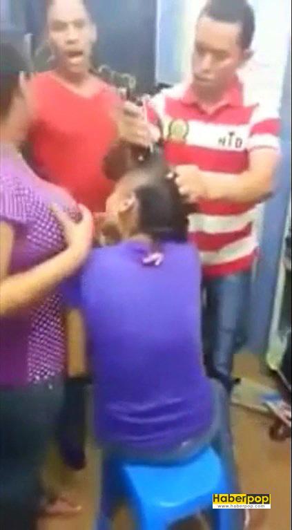 Hırsızlık-yapan-iki-kızın-saçları-mağaza-sahibi-tarafından-kesildi-videosu