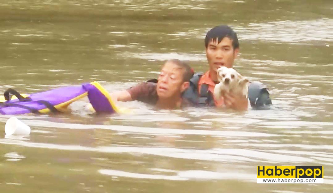 Selde-boğulan-kadını-ve-köpeğini-böyle-kurtardı-video-izle