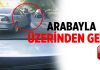 Önündeki adamın üzerinden arabasıyla geçti